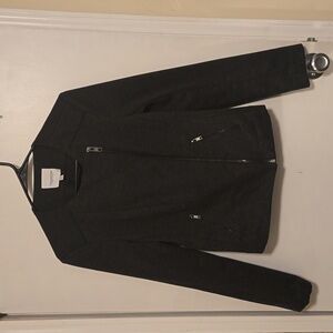 Charcoal gray fitted blazer with asymmetrical zipper.
